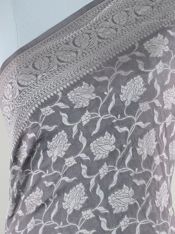 Katan Woven in the heart of Varanasi, this georgette saree features an intricate all-over jaal that glistens across its fluid, lightweight fabric. Elegant and ethereal, it brings together tradition and ease—ideal for evening celebrations and graceful occasions.br
#GeorgetteSaree #JaalWork #VaranasiWeaves #EtherealElegance #HandloomGrace #Manoranjitham #ManoranjithamStyle Nirmala - Georgette Saree | Full Jaal Zari - Manoranjitham Weaves - Handloom Store