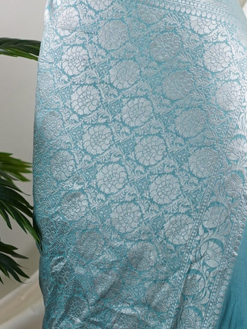 Katan Woven in the heart of Varanasi, this georgette saree features an intricate all-over jaal that glistens across its fluid, lightweight fabric. Elegant and ethereal, it brings together tradition and ease—ideal for evening celebrations and graceful occasions.br
#GeorgetteSaree #JaalWork #VaranasiWeaves #EtherealElegance #HandloomGrace #Manoranjitham #ManoranjithamStyle Pallavi - Georgette Saree | Full Jaal Zari - Manoranjitham Weaves - Handloom Store