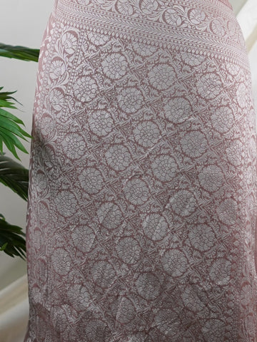 Katan Woven in the heart of Varanasi, this georgette saree features an intricate all-over jaal that glistens across its fluid, lightweight fabric. Elegant and ethereal, it brings together tradition and ease—ideal for evening celebrations and graceful occasions.br
#GeorgetteSaree #JaalWork #VaranasiWeaves #EtherealElegance #HandloomGrace #Manoranjitham #ManoranjithamStyle Padmini - Georgette Saree | Full Jaal Zari - Manoranjitham Weaves - Handloom Store
