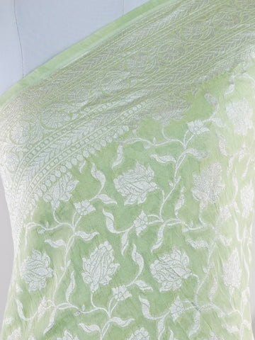Katan Woven in the heart of Varanasi, this georgette saree features an intricate all-over jaal that glistens across its fluid, lightweight fabric. Elegant and ethereal, it brings together tradition and ease—ideal for evening celebrations and graceful occasions.br
#GeorgetteSaree #JaalWork #VaranasiWeaves #EtherealElegance #HandloomGrace #Manoranjitham #ManoranjithamStyle Prabha - Georgette Saree | Full Jaal Zari - Manoranjitham Weaves - Handloom Store
