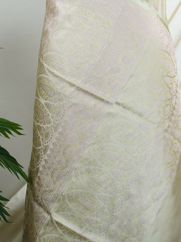 Katan Woven in Varanasi, this semi Mushru saree features the distinctive texture of iktara weave, blending subtle sheen with artisanal charm. Lightweight yet rich in detail, it offers effortless elegance for both traditional events and contemporary celebrations.br
#SemiMushru #IktaraWeave #VaranasiSaree #TexturedElegance #HandloomTradition #Manoranjitham #ManoranjithamStyle Vimala - Semi Silk Saree | Nan Zari Work | Handwoven - Manoranjitham Weaves - Handloom Store