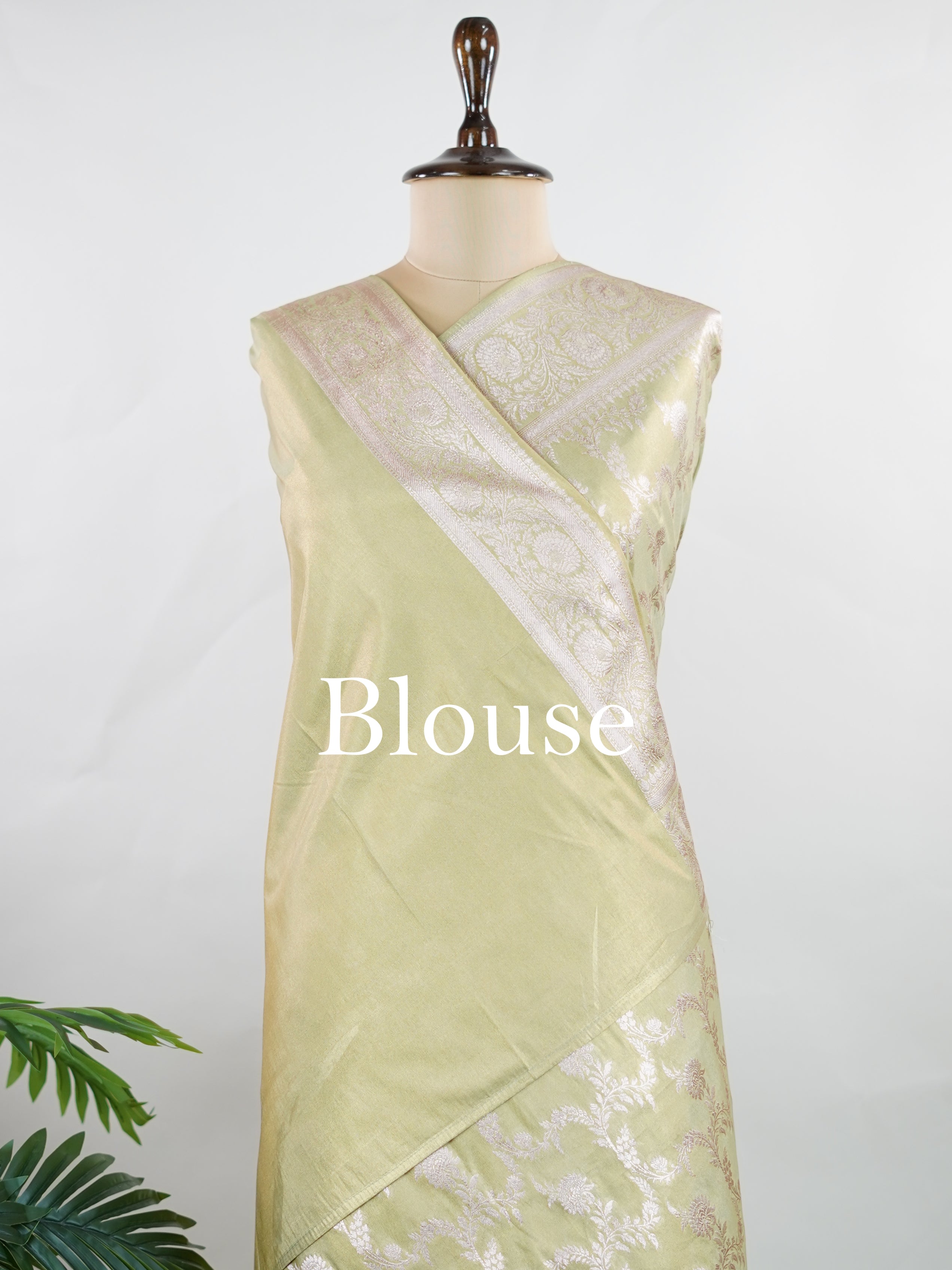 Semi Silk In a lush green hue with fine gold zari jaal, this semi tissue saree from Varanasi shimmers with understated grandeur. The delicate weave and sheer finish create a light yet festive drape—perfect for elegant rituals and serene celebrations.br
#SemiTissueSaree #FineZariWeave #GreenAndGold #VaranasiElegance #HandloomHeritage #Manoranjitham #ManoranjithamStyle Nayana - Semi Silk Saree | Full Jaal Zari - Manoranjitham Weaves - Handloom Store
