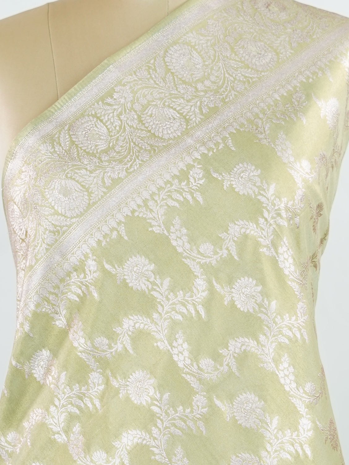 Semi Silk In a lush green hue with fine gold zari jaal, this semi tissue saree from Varanasi shimmers with understated grandeur. The delicate weave and sheer finish create a light yet festive drape—perfect for elegant rituals and serene celebrations.br
#SemiTissueSaree #FineZariWeave #GreenAndGold #VaranasiElegance #HandloomHeritage #Manoranjitham #ManoranjithamStyle Nayana - Semi Silk Saree | Full Jaal Zari - Manoranjitham Weaves - Handloom Store