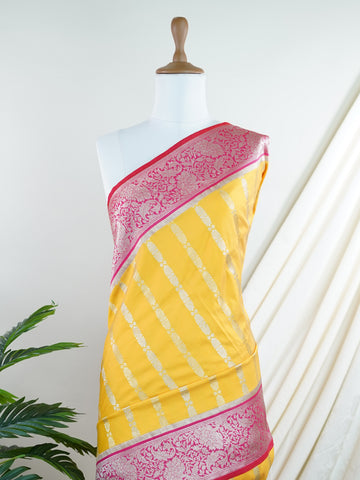 Katan Bright and joyful, this Katan semi silk saree from Varanasi features vivid yellow softened by pink stripes that lend it a playful rhythm. The silk's gentle sheen pairs with the structured weave to create a look that's both traditional and refreshingly modern.br
#KatanSemiSilk #StripedSaree #YellowAndPink #VaranasiWeaves #HandloomCharm #Manoranjitham #ManoranjithamStyle Neelima - Semi Silk Saree | Nan Zari Work | Handwoven - Manoranjitham Weaves - Handloom Store