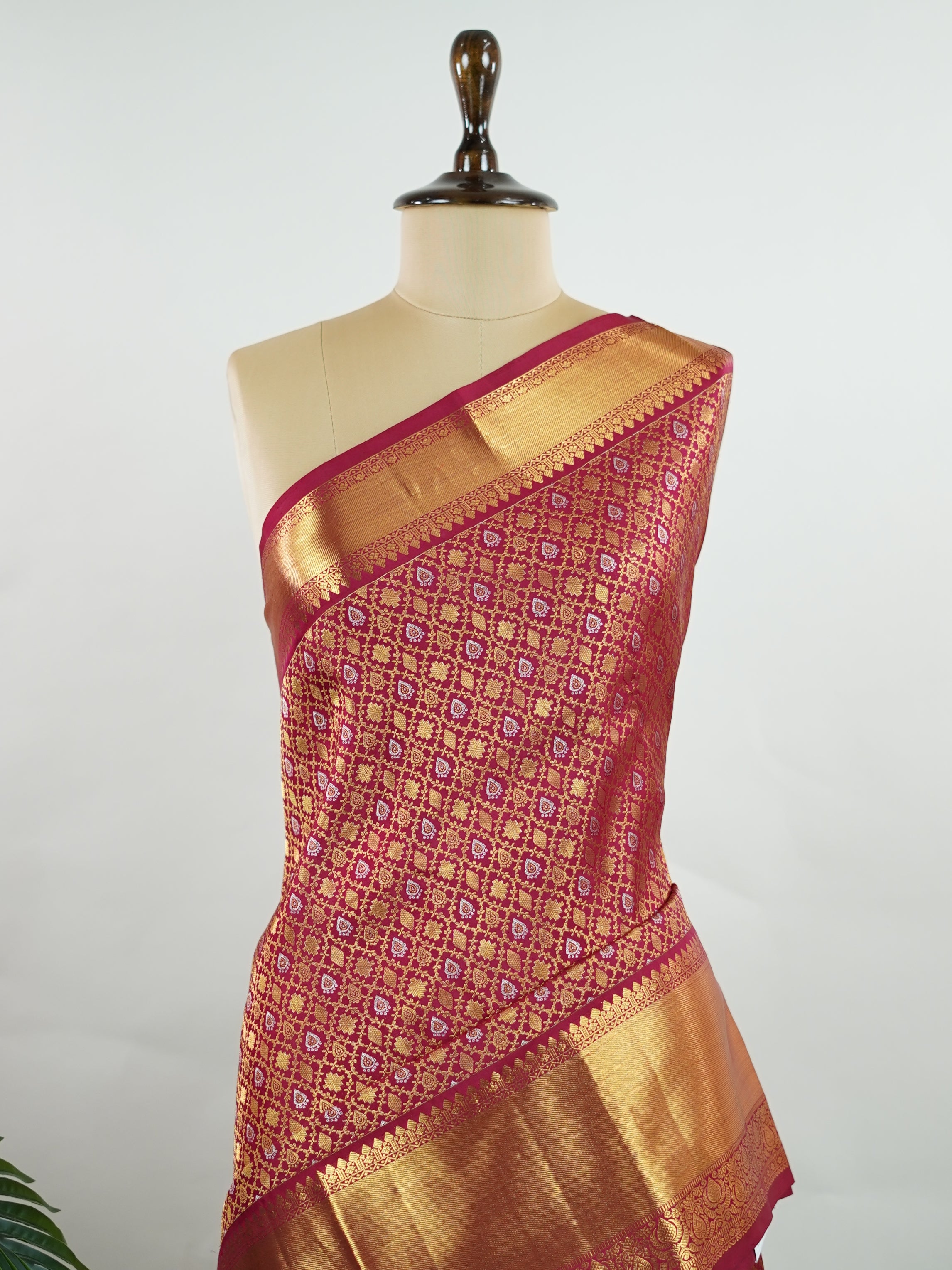 Kanchipuram Silk This red Kanchipuram silk saree is woven from 100% pure silk with gold and silver zari buttas. The golden shimmer adds a touch of tradition and elegance. Soft, rich, and timeless — perfect for weddings and festive occasions. A classic treasure from Kanchipuram's handloom legacy.             #ManoranjithamSilks #KanjivaramHandloom #PureSilkSaree #BridalElegance #TimelessTradition Bhairavia - Manoranjitham Weaves - Handloom Store