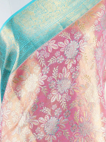 Kanchipuram Silk A delightful pink silk saree adorned with gold and silver zari buttas, paired with a striking cyan border. This saree celebrates the harmony of vibrant hues and intricate handloom artistry — perfect for weddings and timeless celebrations.             #ManoranjithamSilks #KanjivaramHandloom #PureSilkSaree #BridalElegance #TimelessTradition Atana - Pink Pure Kanjivaram Silk Saree | Zari Buttas - Manoranjitham Weaves - Handloom Store