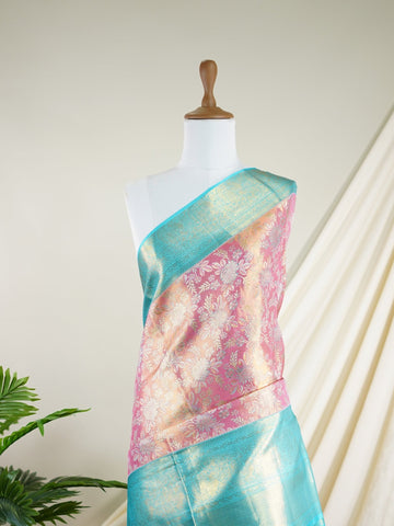 Kanchipuram Silk A delightful pink silk saree adorned with gold and silver zari buttas, paired with a striking cyan border. This saree celebrates the harmony of vibrant hues and intricate handloom artistry — perfect for weddings and timeless celebrations.             #ManoranjithamSilks #KanjivaramHandloom #PureSilkSaree #BridalElegance #TimelessTradition Atana - Pink Pure Kanjivaram Silk Saree | Zari Buttas - Manoranjitham Weaves - Handloom Store
