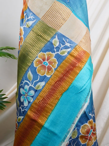Tussars A Tussar saree with digital print and intricate Aari Peeta embroidery, combining modern design with delicate handcraft. Bageshree - Manoranjitham Weaves - Handloom Store