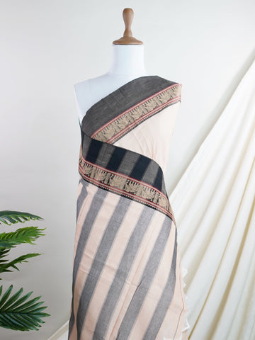 Narayanpet Narayanpet Cotton sarees are beloved for their soft feel, classic checks, and contrast borders. Handwoven to be breathable and elegant, they’re perfect for long days, warm weather, and soulful rituals. Tradition meets everyday comfort in these heritage cottons.

#Manoranjitham #NarayanpetCotton #HandloomCottons #EverydayElegance #WovenTradition #LightAndClassic #CottonSarees #SouthIndianWeaves #SoftDrapes #TimelessCottons #CheckeredCharm Gowri Priya - Handloom Cotton Saree | Classic Checks - Mano