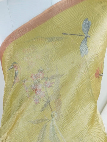 tissue This lightweight Semi Tissue saree from Varanasi blends the translucent beauty of tissue fabric with fine zari weave patterns that shimmer delicately across its surface. Its smooth drape and luminous finish make it a versatile choice for festive occasions, evening outings, and celebrations. A beautiful balance of traditional craftsmanship and contemporary wearability. Semi Tissue - Semi Silk Saree - Manoranjitham Weaves - Handloom Store