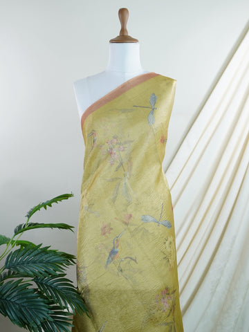 tissue This lightweight Semi Tissue saree from Varanasi blends the translucent beauty of tissue fabric with fine zari weave patterns that shimmer delicately across its surface. Its smooth drape and luminous finish make it a versatile choice for festive occasions, evening outings, and celebrations. A beautiful balance of traditional craftsmanship and contemporary wearability. Semi Tissue - Semi Silk Saree - Manoranjitham Weaves - Handloom Store
