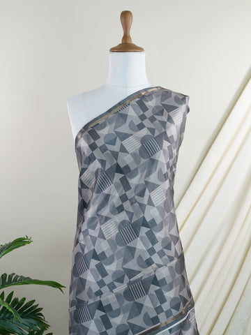 Katan This Semi Silk saree in soft cream blends delicate embroidery with digital print for a graceful finish. With no zari, its beauty lies in subtle textures and intricate detailing. Woven in Varanasi, it offers comfort with a refined aesthetic. A perfect pick for understated elegance. #SemiSilk #CreamElegance #EmbroideryDetails #VaranasiWeaves #ManoranjithamSarees Semi Tussar - Semi Silk Saree | Digital Print - Manoranjitham Weaves - Handloom Store