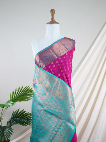 Kanchipuram Silk Handwoven by skilled artisans of Kanchipuram, this Kanjivaram saree in Red blends traditional elegance with intricate Pure Zari zari work. A truly stunning drape for special occasions. The interplay of colors and craftsmanship makes it a treasured piece for every saree connoisseur. Begada - Manoranjitham Weaves - Handloom Store