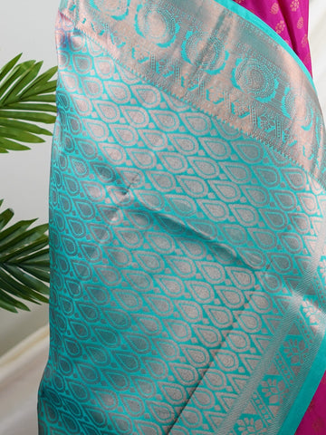 Kanchipuram Silk Handwoven by skilled artisans of Kanchipuram, this Kanjivaram saree in Red blends traditional elegance with intricate Pure Zari zari work. A truly stunning drape for special occasions. The interplay of colors and craftsmanship makes it a treasured piece for every saree connoisseur. Begada - Manoranjitham Weaves - Handloom Store