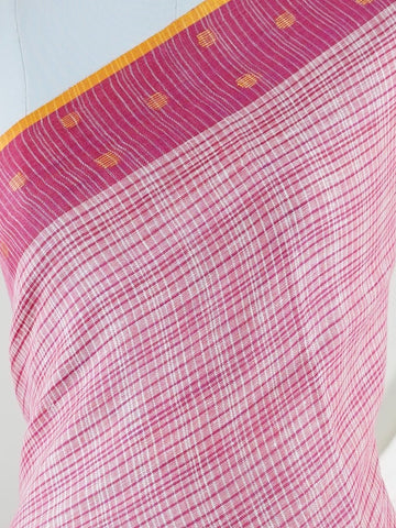 Linen Lightweight, breathable, and effortlessly elegant — the linen saree is a modern classic rooted in comfort. With its soft texture and subtle natural sheen, it’s perfect for warm days, office wear, or casual gatherings. Draping beautifully with a relaxed fall, linen brings simplicity, grace, and contemporary charm to everyday tradition. Devagandharam - Handloom Cotton Saree | Zari Border | Traditional - Manoranjitham Weaves - Handloom Store