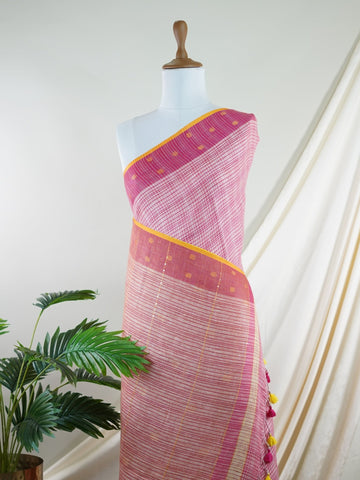 Linen Lightweight, breathable, and effortlessly elegant — the linen saree is a modern classic rooted in comfort. With its soft texture and subtle natural sheen, it’s perfect for warm days, office wear, or casual gatherings. Draping beautifully with a relaxed fall, linen brings simplicity, grace, and contemporary charm to everyday tradition. Devagandharam - Handloom Cotton Saree | Zari Border | Traditional - Manoranjitham Weaves - Handloom Store