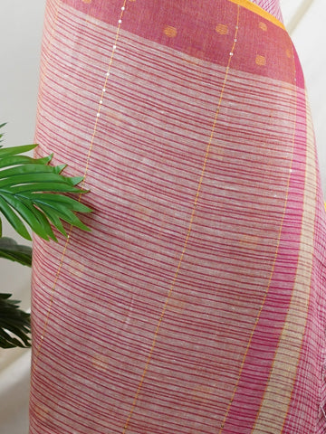 Linen Lightweight, breathable, and effortlessly elegant — the linen saree is a modern classic rooted in comfort. With its soft texture and subtle natural sheen, it’s perfect for warm days, office wear, or casual gatherings. Draping beautifully with a relaxed fall, linen brings simplicity, grace, and contemporary charm to everyday tradition. Devagandharam - Handloom Cotton Saree | Zari Border | Traditional - Manoranjitham Weaves - Handloom Store