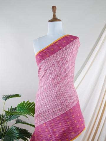 Linen Lightweight, breathable, and effortlessly elegant — the linen saree is a modern classic rooted in comfort. With its soft texture and subtle natural sheen, it’s perfect for warm days, office wear, or casual gatherings. Draping beautifully with a relaxed fall, linen brings simplicity, grace, and contemporary charm to everyday tradition. Devagandharam - Handloom Cotton Saree | Zari Border | Traditional - Manoranjitham Weaves - Handloom Store