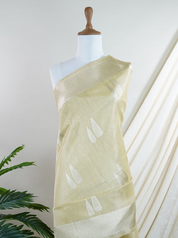 tissue Drenched in gold, this Semi Tissue saree shimmers with floral weave detailing and fine zari. Its lightweight texture and luminous finish make it a festive favourite. Crafted in Varanasi, it carries elegance in every thread. Ideal for weddings, receptions, and moments that deserve radiance. #SemiTissue #GoldenGlow #FloralWeave #FineZari #ManoranjithamSarees Devika - Semi Silk Saree - Manoranjitham Weaves - Handloom Store