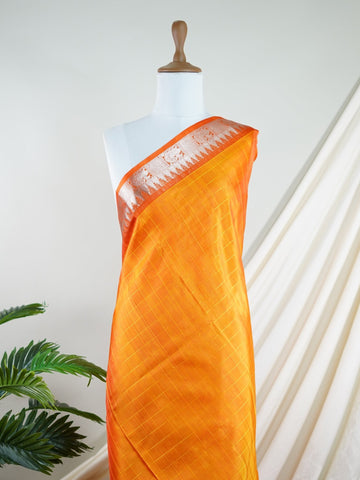 Venkatagiri Silk This 100% Pure Silk  silk saree, adorned in Coral and detailed with Pure Zari weaving, reflects the grandeur of Venkatagiri. The timeless Buttis motifs enhance its bridal charm. A perfect blend of luxury and tradition, it is designed for those who appreciate fine craftsmanship. Gaud Sarang - Manoranjitham Weaves - Handloom Store
