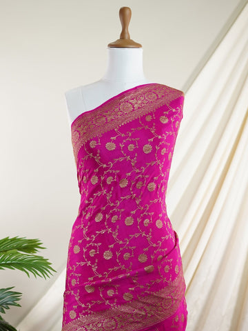 Crepe Woven in the heritage looms of Varanasi, this 100% pure crepe saree comes alive in pink with an all-over gold jaal. The intricate pattern glows softly on the fluid drape, offering a rich yet graceful silhouette. A perfect pick for festive gatherings and timeless celebrations.br
#VaranasiCrepe #GoldJaalSaree #PinkElegance #HandloomHeritage #FestiveDrapes Gorakh Kalyan - Pink Pure Banarasi Silk Saree | Full Jaal Zari - Manoranjitham Weaves - Handloom Store