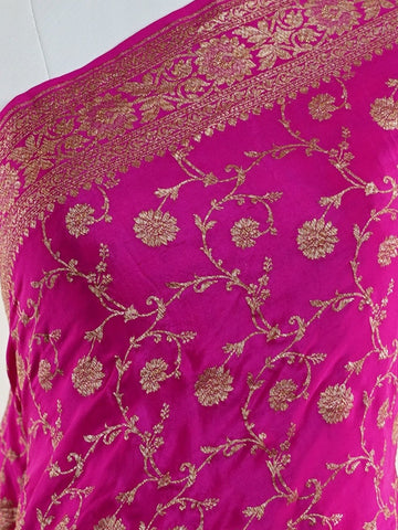 Crepe Woven in the heritage looms of Varanasi, this 100% pure crepe saree comes alive in pink with an all-over gold jaal. The intricate pattern glows softly on the fluid drape, offering a rich yet graceful silhouette. A perfect pick for festive gatherings and timeless celebrations.br
#VaranasiCrepe #GoldJaalSaree #PinkElegance #HandloomHeritage #FestiveDrapes Gorakh Kalyan - Pink Pure Banarasi Silk Saree | Full Jaal Zari - Manoranjitham Weaves - Handloom Store