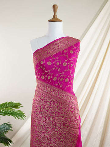 Crepe Woven in the heritage looms of Varanasi, this 100% pure crepe saree comes alive in pink with an all-over gold jaal. The intricate pattern glows softly on the fluid drape, offering a rich yet graceful silhouette. A perfect pick for festive gatherings and timeless celebrations.br
#VaranasiCrepe #GoldJaalSaree #PinkElegance #HandloomHeritage #FestiveDrapes Gorakh Kalyan - Pink Pure Banarasi Silk Saree | Full Jaal Zari - Manoranjitham Weaves - Handloom Store