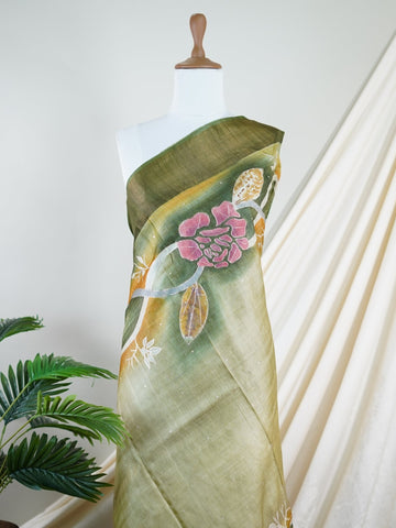 Tussars A Tussar saree with digital print and intricate Aari Peeta work, combining contemporary style with delicate handcraft. Hemanta - Manoranjitham Weaves - Handloom Store