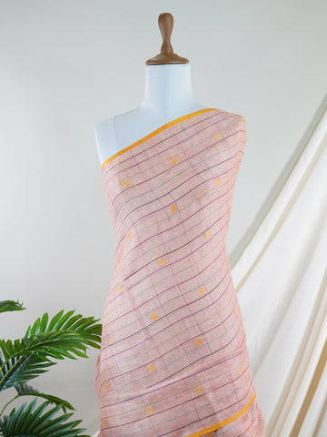 Linen A masterpiece from Gujarat, this Linen saree in Cream Peach is a tribute to India's rich handloom legacy. The nan weaving and Handwork motifs make it a perfect choice for brides and celebrations. Every thread speaks of elegance, tradition, and the skilled hands that bring this saree to life. Hemanta - Cream Handloom Cotton Saree | Zari Border | Traditional - Manoranjitham Weaves - Handloom Store