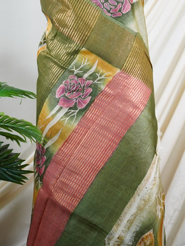 Tussars A Tussar saree with digital print and intricate Aari Peeta work, combining contemporary style with delicate handcraft. Hemanta - Manoranjitham Weaves - Handloom Store