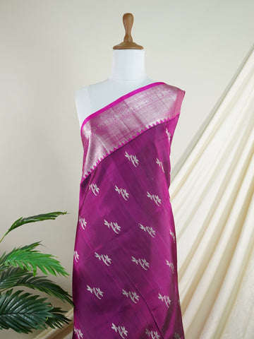 Venkatagiri Silk This 100% Pure Silk  silk saree, adorned in Maroon Pink and detailed with Pure Zari weaving, reflects the grandeur of Venkatagiri. The timeless Buttis motifs enhance its bridal charm. A perfect blend of luxury and tradition, it is designed for those who appreciate fine craftsmanship. Jaunpuri - Manoranjitham Weaves - Handloom Store