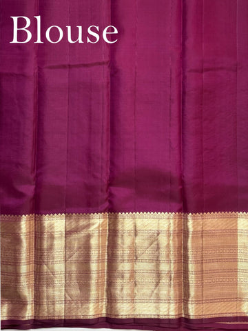 Kanchipuram Silk A masterpiece from Maharashtra, this 100% Pure Silk  saree in Baby Pink is a tribute to India's rich handloom legacy. The Pure Zari weaving and Buttis motifs make it a perfect choice for brides and celebrations. Every thread speaks of elegance, tradition, and the skilled hands that bring this saree to life. Jaunpuri - Pure Kanjivaram Silk Saree | Pure Zari - Manoranjitham Weaves - Handloom Store