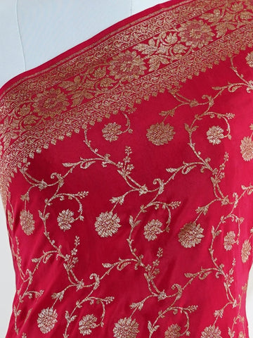 Crepe In bold red and radiant gold, this 100% pure crepe saree from Varanasi is adorned with delicate floral motifs. The soft drape and intricate weave bring together grace and grandeur in perfect harmony. A timeless piece for weddings, rituals, and every cherished celebration.br
#RedAndGoldSaree #VaranasiWeave #PureCrepeElegance #FloralHeritage #HandloomStories Jayantashree - Red Pure Banarasi Silk Saree | Woven Jaal - Manoranjitham Weaves - Handloom Store
