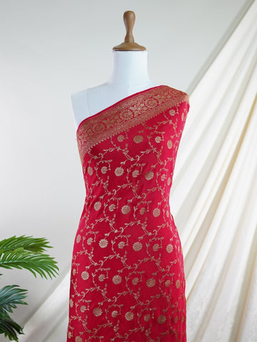Crepe In bold red and radiant gold, this 100% pure crepe saree from Varanasi is adorned with delicate floral motifs. The soft drape and intricate weave bring together grace and grandeur in perfect harmony. A timeless piece for weddings, rituals, and every cherished celebration.br
#RedAndGoldSaree #VaranasiWeave #PureCrepeElegance #FloralHeritage #HandloomStories Jayantashree - Red Pure Banarasi Silk Saree | Woven Jaal - Manoranjitham Weaves - Handloom Store