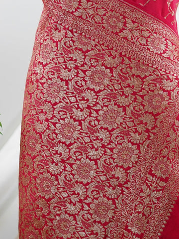 Crepe In bold red and radiant gold, this 100% pure crepe saree from Varanasi is adorned with delicate floral motifs. The soft drape and intricate weave bring together grace and grandeur in perfect harmony. A timeless piece for weddings, rituals, and every cherished celebration.br
#RedAndGoldSaree #VaranasiWeave #PureCrepeElegance #FloralHeritage #HandloomStories Jayantashree - Red Pure Banarasi Silk Saree | Woven Jaal - Manoranjitham Weaves - Handloom Store