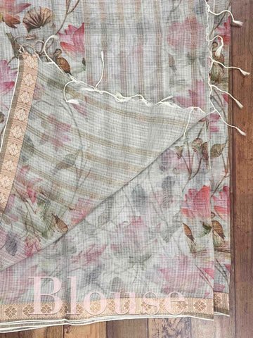 Kota Handwoven by skilled artisans of Maharashtra, this Kota saree in Grey blends traditional elegance with intricate nan zari work. A truly stunning drape for special occasions. The interplay of colors and craftsmanship makes it a treasured piece for every saree connoisseur. Joga - Manoranjitham Weaves - Handloom Store