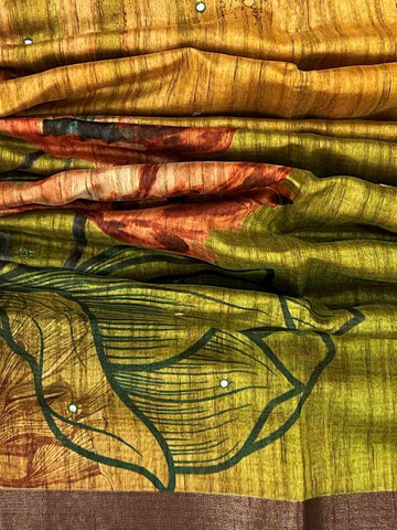 Tussars This Semi Tussar silk saree, adorned in Green and detailed with Semi Pure Zari weaving, reflects the grandeur of Rajasthan. The timeless Mirror Work motifs enhance its bridal charm. A perfect blend of luxury and tradition, it is designed for those who appreciate fine craftsmanship. Kaunsi Kanada - Art Silk saree - Manoranjitham Weaves - Handloom Store