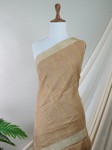 Handspun Cotton This Handpsun Cotton silk saree, adorned in Tan Cream and detailed with nan weaving, reflects the grandeur of Gujarat. The timeless Handwork motifs enhance its bridal charm. A perfect blend of luxury and tradition, it is designed for those who appreciate fine craftsmanship. Madhukaunsa - Handloom Cotton Saree | Zari Border | Traditional - Manoranjitham Weaves - Handloom Store