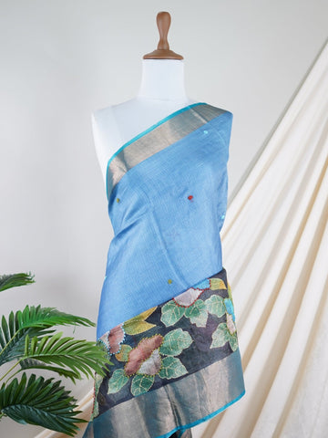 Tussars 
A Kota saree with digital print and delicate hand embroidered knot work, blending contemporary design with traditional craftsmanship Malkaunsa     - Manoranjitham Weaves - Handloom Store
