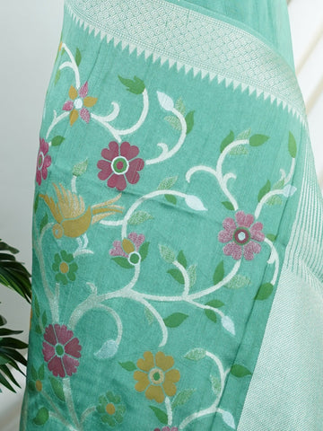 Georgette This Tussar Georgette saree from Varanasi brings together the textured richness of tussar silk with the fluid grace of georgette. Woven on a powerloom, it drapes light and airy, perfect for effortless elegance. Ideal for both day events and evening gatherings, it reflects quiet sophistication with a modern twist on tradition. Manjari - Georgette Saree | Handwoven | Varanasi - Manoranjitham Weaves - Handloom Store