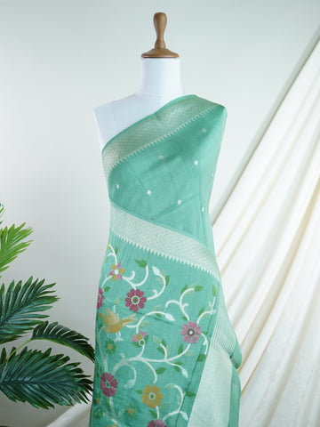 Georgette This Tussar Georgette saree from Varanasi brings together the textured richness of tussar silk with the fluid grace of georgette. Woven on a powerloom, it drapes light and airy, perfect for effortless elegance. Ideal for both day events and evening gatherings, it reflects quiet sophistication with a modern twist on tradition. Manjari - Georgette Saree | Handwoven | Varanasi - Manoranjitham Weaves - Handloom Store