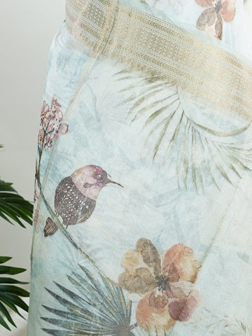 Organza Handwoven by skilled artisans of Karnataka, this 100% Pure Silk  saree in Powder Cyan blends traditional elegance with intricate nan zari work. A truly stunning drape for special occasions. The interplay of colors and craftsmanship makes it a treasured piece for every saree connoisseur. Marwa - Manoranjitham Weaves - Handloom Store