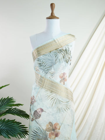 Organza Handwoven by skilled artisans of Karnataka, this 100% Pure Silk  saree in Powder Cyan blends traditional elegance with intricate nan zari work. A truly stunning drape for special occasions. The interplay of colors and craftsmanship makes it a treasured piece for every saree connoisseur. Marwa - Manoranjitham Weaves - Handloom Store