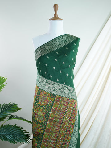 Georgette This Tussar Georgette saree from Varanasi brings together the textured richness of tussar silk with the fluid grace of georgette. Woven on a powerloom, it drapes light and airy, perfect for effortless elegance. Ideal for both day events and evening gatherings, it reflects quiet sophistication with a modern twist on tradition. Mridula - Georgette Saree | Handwoven | Varanasi - Manoranjitham Weaves - Handloom Store