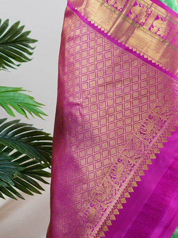 Kanchipuram Silk A masterpiece from Kanchipuram, this Kanjivaram saree in Lime Tree Green is a tribute to India's rich handloom legacy. The Pure Zari weaving and Buttis motifs make it a perfect choice for brides and celebrations. Every thread speaks of elegance, tradition, and the skilled hands that bring this saree to life. Nattakurinji - Manoranjitham Weaves - Handloom Store