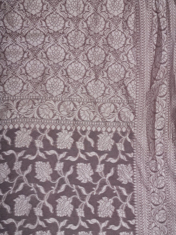 Katan Woven in the heart of Varanasi, this georgette saree features an intricate all-over jaal that glistens across its fluid, lightweight fabric. Elegant and ethereal, it brings together tradition and ease—ideal for evening celebrations and graceful occasions.br
#GeorgetteSaree #JaalWork #VaranasiWeaves #EtherealElegance #HandloomGrace #Manoranjitham #ManoranjithamStyle Nirmala - Georgette Saree | Full Jaal Zari - Manoranjitham Weaves - Handloom Store