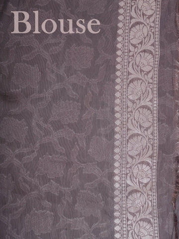 Katan Woven in the heart of Varanasi, this georgette saree features an intricate all-over jaal that glistens across its fluid, lightweight fabric. Elegant and ethereal, it brings together tradition and ease—ideal for evening celebrations and graceful occasions.br
#GeorgetteSaree #JaalWork #VaranasiWeaves #EtherealElegance #HandloomGrace #Manoranjitham #ManoranjithamStyle Nirmala - Georgette Saree | Full Jaal Zari - Manoranjitham Weaves - Handloom Store