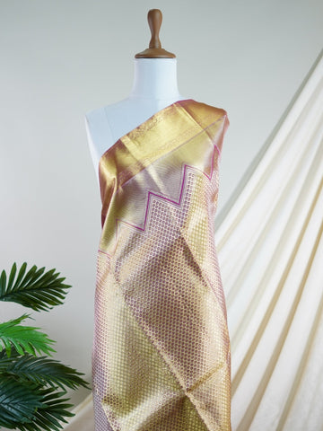 Kanchipuram Silk This Kanjivaram silk saree, adorned in Ivory  and detailed with Pure Zari weaving, reflects the grandeur of Kanchipuram. The timeless Buttis motifs enhance its bridal charm. A perfect blend of luxury and tradition, it is designed for those who appreciate fine craftsmanship. Pantuvarali - Ivory Pure Kanjivaram Silk Saree | Pure Zari - Manoranjitham Weaves - Handloom Store