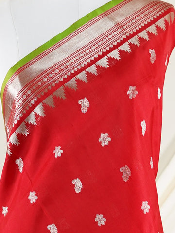 Venkatagiri Silk This 100% Pure Silk  silk saree, adorned in Red and detailed with Pure Zari weaving, reflects the grandeur of Venkatagiri. The timeless Buttis motifs enhance its bridal charm. A perfect blend of luxury and tradition, it is designed for those who appreciate fine craftsmanship. Patdeepa     - Manoranjitham Weaves - Handloom Store