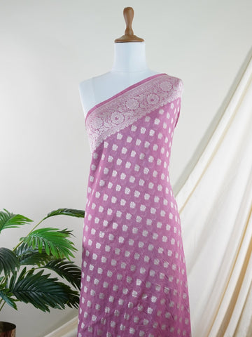 Katan This Varanasi georgette saree is adorned with delicate buttis that shimmer gently across its lightweight, flowing drape. Effortlessly graceful, it’s perfect for those who seek comfort without compromising on tradition. A versatile piece for festive days and elegant evenings.br
#GeorgetteSaree #ButtiElegance #VaranasiWeaves #LightweightLuxury #HandcraftedStyle #Manoranjitham #ManoranjithamStyle Pranita - Georgette Saree | Woven Buttas - Manoranjitham Weaves - Handloom Store